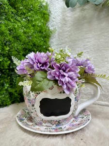 Osłonka filiżanka w kwiaty z tablicą 16