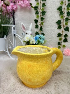 Osłonka dzbanek żółty 20